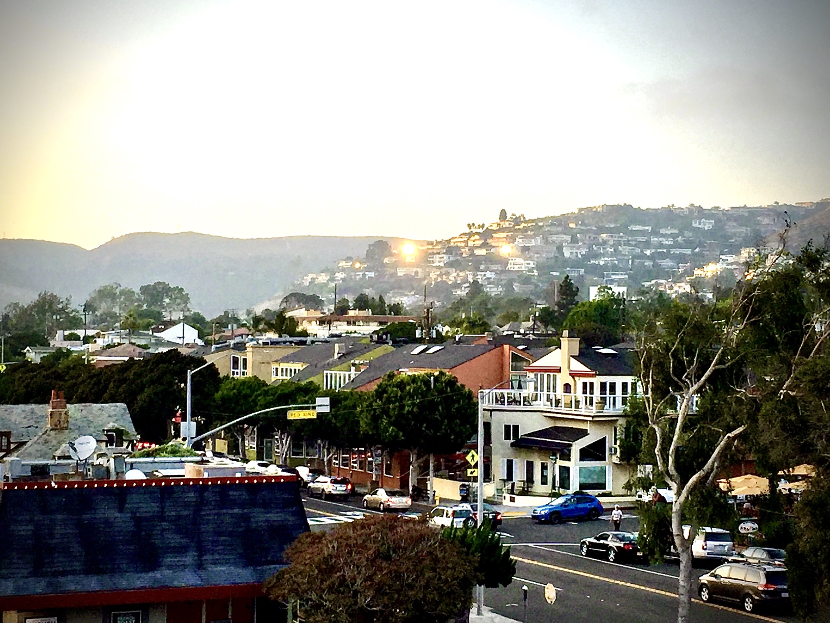 Eating on a rooftop cafe watching traffic on PCH in Laguna Beach